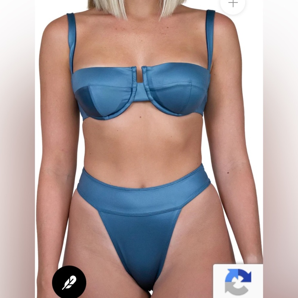 Bathing suit set by House of Zz. New with tags & original packaging,never used.